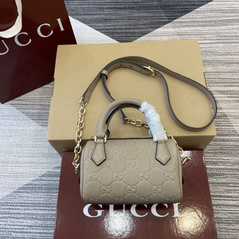 G*u*i top handle bags